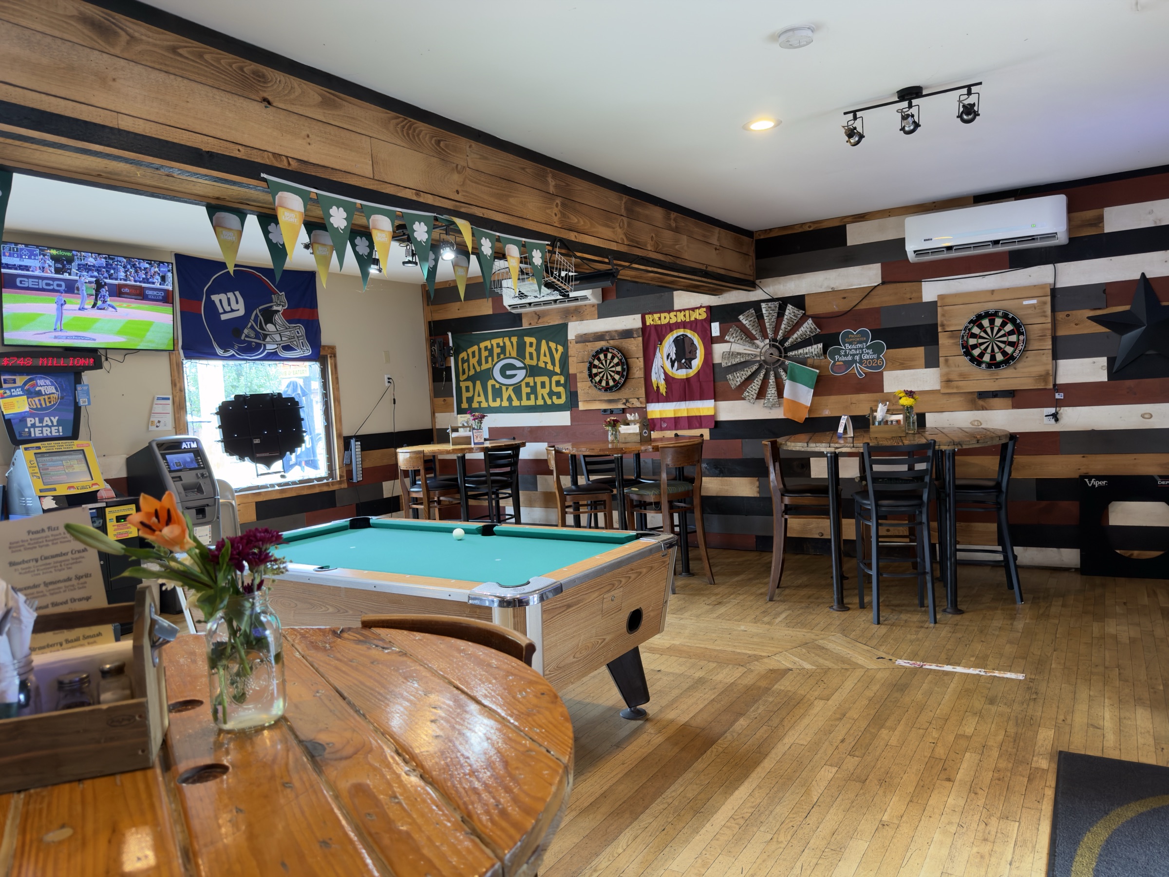 The game room at Stinsons Hub, TVs on every wall